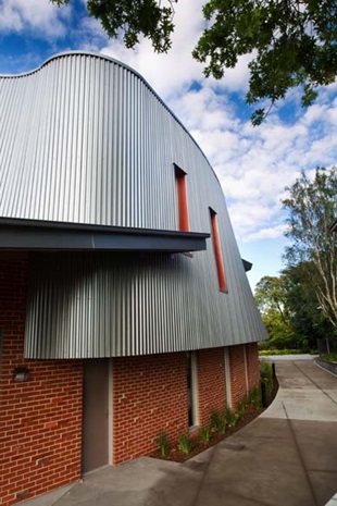 Carey Grammer School, Phil De Young Centre for Performing Arts. This vibrant building, clad in COLORBOND® steel, is designed as a music hall, performance space and reception for the school.